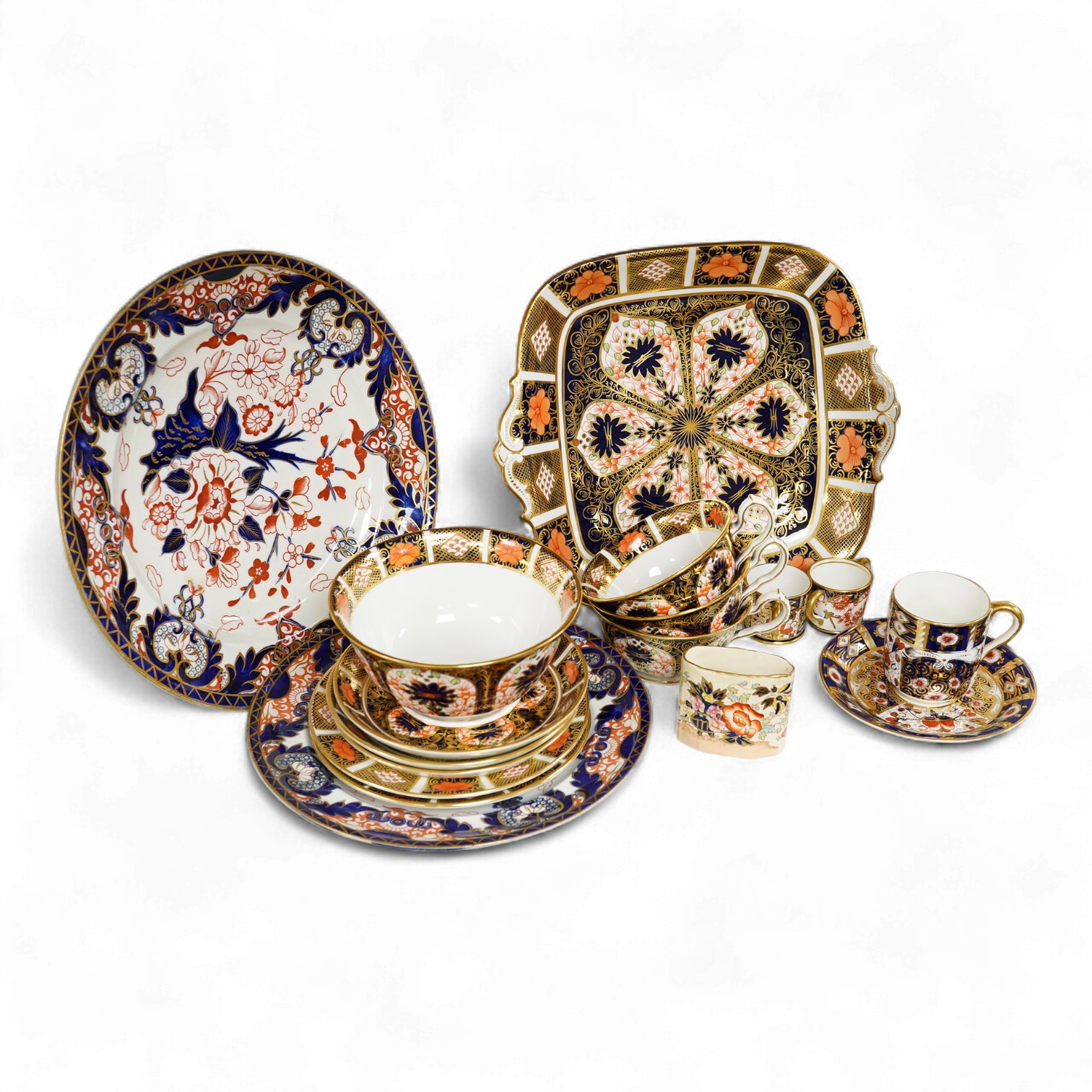 A quantity of Royal Crown Derby Imari to include a sandwich plate, cups and saucers and and miniature twin handled cups, largest 27cm in diameter